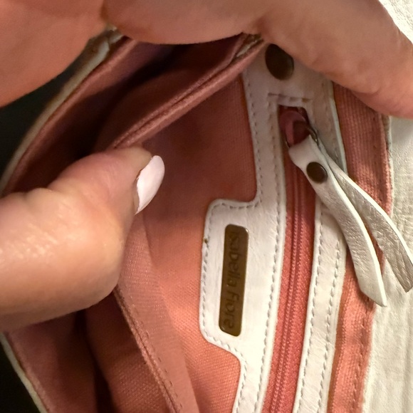 Isabella Fiore Cream Leather Clutch/wristlet with Tassel, Buckle, and studs - Picture 5 of 12